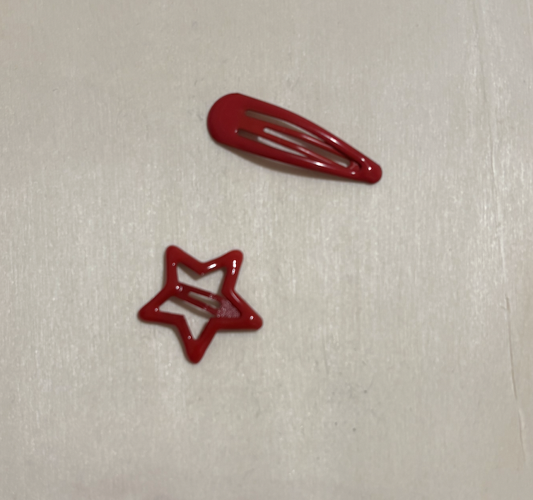 A wearable hairclip, putting it on would be the interaction.